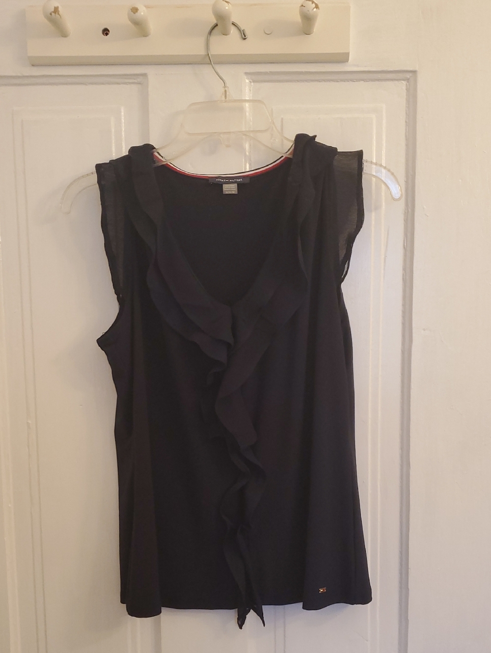 Black Ruffle Front Sleeveless Top